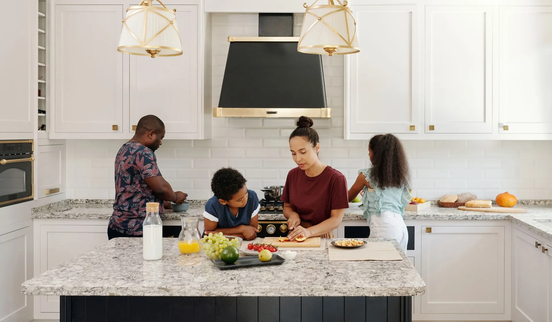 A family preparing a meal together in the kitchen